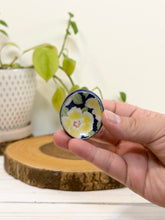 Load image into Gallery viewer, #036 - Yellow flower Calming stone with blue rim
