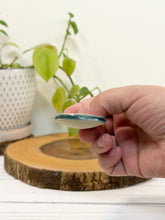 Load image into Gallery viewer, #040 - Red flower patterned Calming stone with green rim
