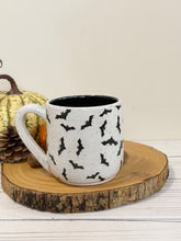 Load image into Gallery viewer, #003 - 16 oz. Bat patterned white speckled mug with black inside
