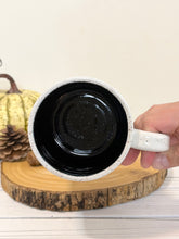 Load image into Gallery viewer, #004 - 16 oz. Skeleton patterned white speckled mug with black inside
