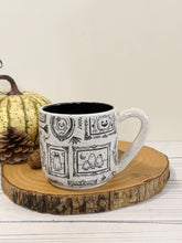 Load image into Gallery viewer, #006 - 16 oz. Ghost patterned white speckled mug with black inside
