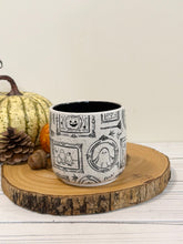 Load image into Gallery viewer, #006 - 16 oz. Ghost patterned white speckled mug with black inside
