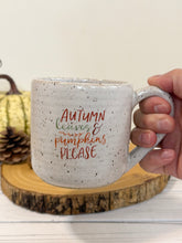 Load image into Gallery viewer, #010 - 16 oz. “Autumn leaves and pumpkins please” white speckled mug
