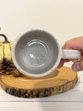 Load image into Gallery viewer, #012 - 16 oz. “Pumpkin spice and everything nice” on white speckled mug
