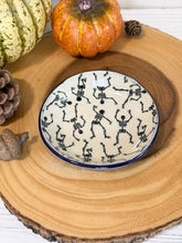 Load image into Gallery viewer, #050 -  Skeleton patterned Ring / trinket dish with purple rim
