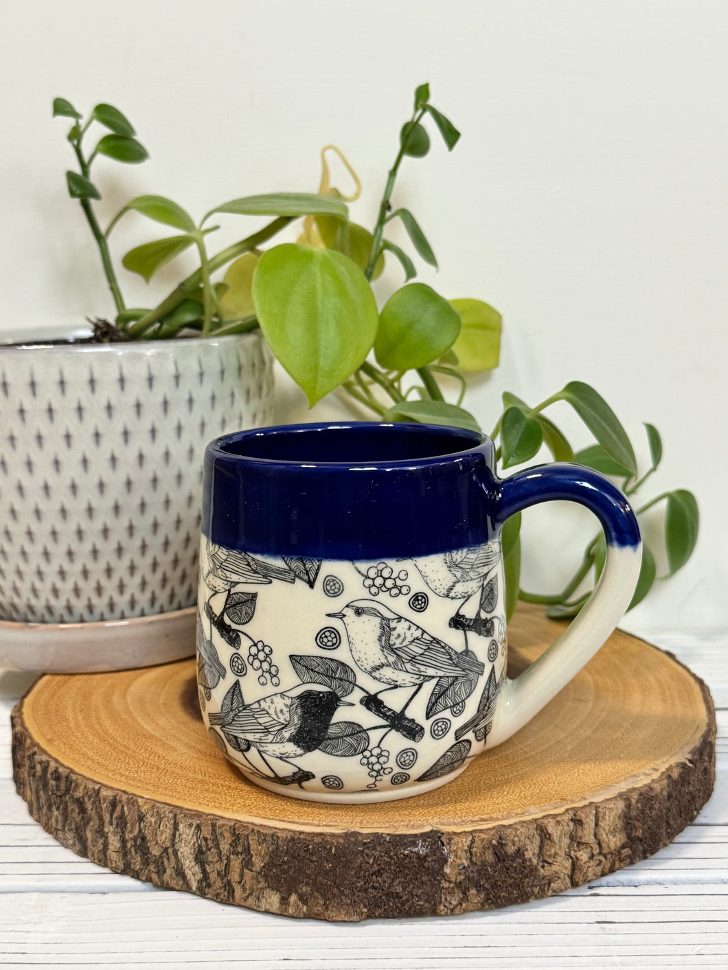 #003 - 14-16 oz. Bird patterned mug with cobalt blue rim