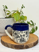 Load image into Gallery viewer, #004 - 14-16 oz. Floral bouquet patterned mug with cobalt blue rim
