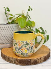 Load image into Gallery viewer, #013 - 16 oz. Flower patterned mug with yellow rim green inside *see notes
