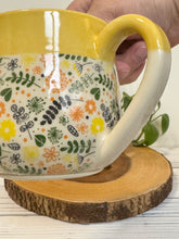 Load image into Gallery viewer, #013 - 16 oz. Flower patterned mug with yellow rim green inside *see notes

