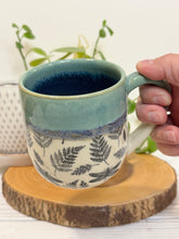 Load image into Gallery viewer, #014 - 14-16 oz. Dragonfly and fern patterned mug with green rim blue inside *see notes
