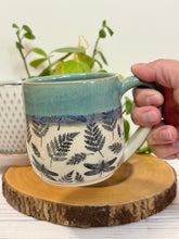 Load image into Gallery viewer, #014 - 14-16 oz. Dragonfly and fern patterned mug with green rim blue inside *see notes
