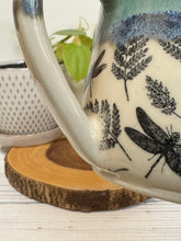 Load image into Gallery viewer, #014 - 14-16 oz. Dragonfly and fern patterned mug with green rim blue inside *see notes
