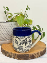 Load image into Gallery viewer, #015 - 14-16 oz. Sea creature patterned mug with cobalt blue rim

