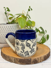 Load image into Gallery viewer, #015 - 14-16 oz. Sea creature patterned mug with cobalt blue rim
