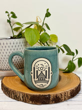 Load image into Gallery viewer, #021 - 16 oz. Cabin mug with green glaze (pattern on bare clay) and blue inside *see note
