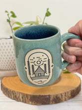 Load image into Gallery viewer, #021 - 16 oz. Cabin mug with green glaze (pattern on bare clay) and blue inside *see note
