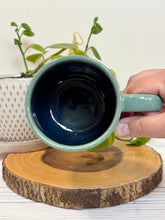 Load image into Gallery viewer, #021 - 16 oz. Cabin mug with green glaze (pattern on bare clay) and blue inside *see note
