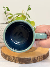 Load image into Gallery viewer, #024 - 16 oz. Adventure wilderness mug with green glaze (pattern on bare clay) and blue inside
