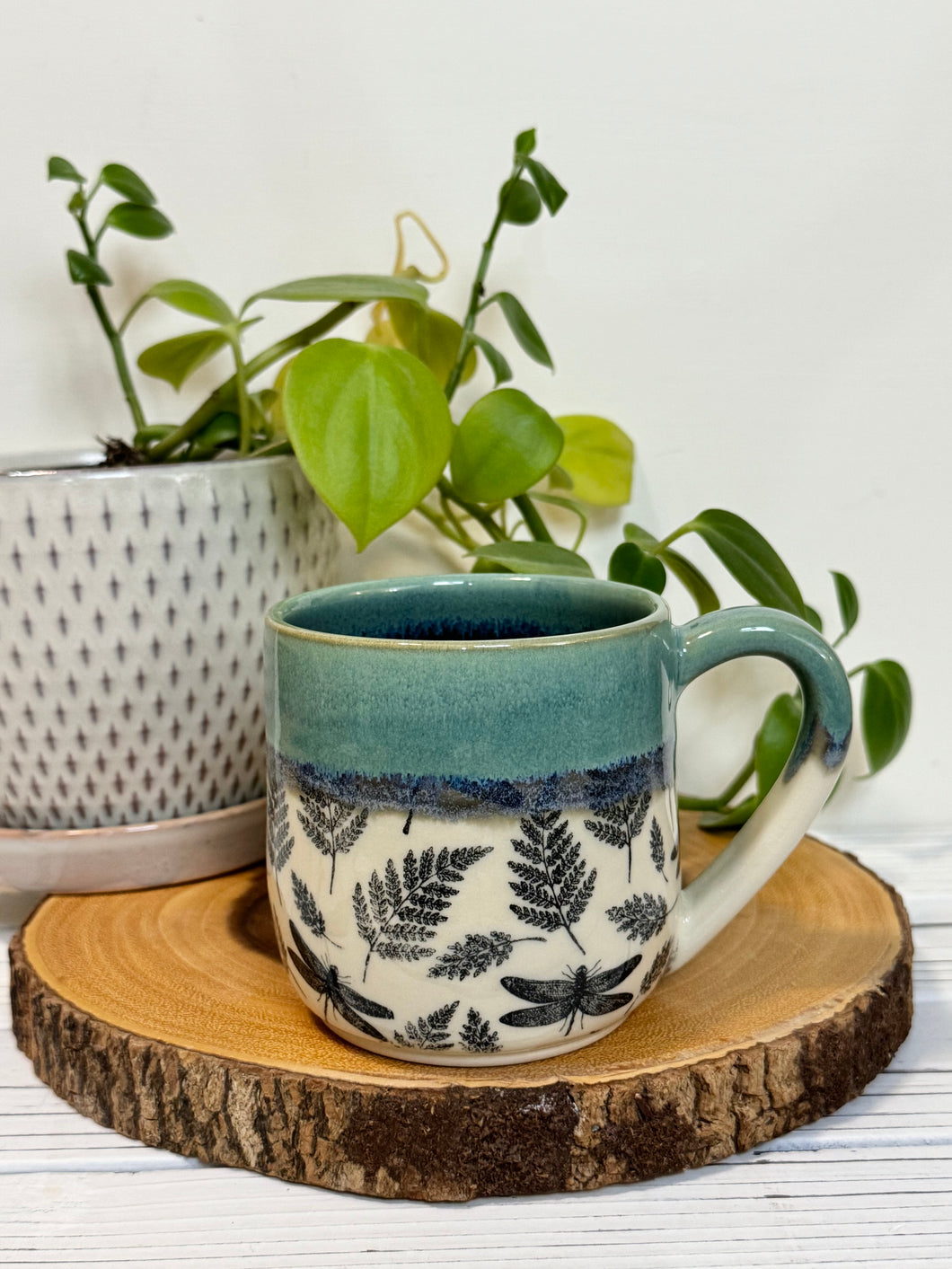 #014 - 14-16 oz. Dragonfly and fern patterned mug with green rim blue inside *see notes