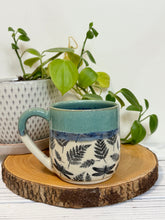 Load image into Gallery viewer, #014 - 14-16 oz. Dragonfly and fern patterned mug with green rim blue inside *see notes
