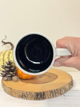 Load image into Gallery viewer, #002 - 16 oz. White speckled mug with Halloween ghost patterns. Black inside. * See notes
