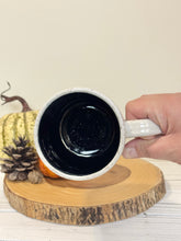 Load image into Gallery viewer, #003 - 16 oz. White speckled mug with Halloween ghost patterns. Black inside.
