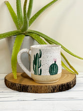 Load image into Gallery viewer, #001 - 16 oz. Cactus pattern on White speckled mug with bare clay at bottom
