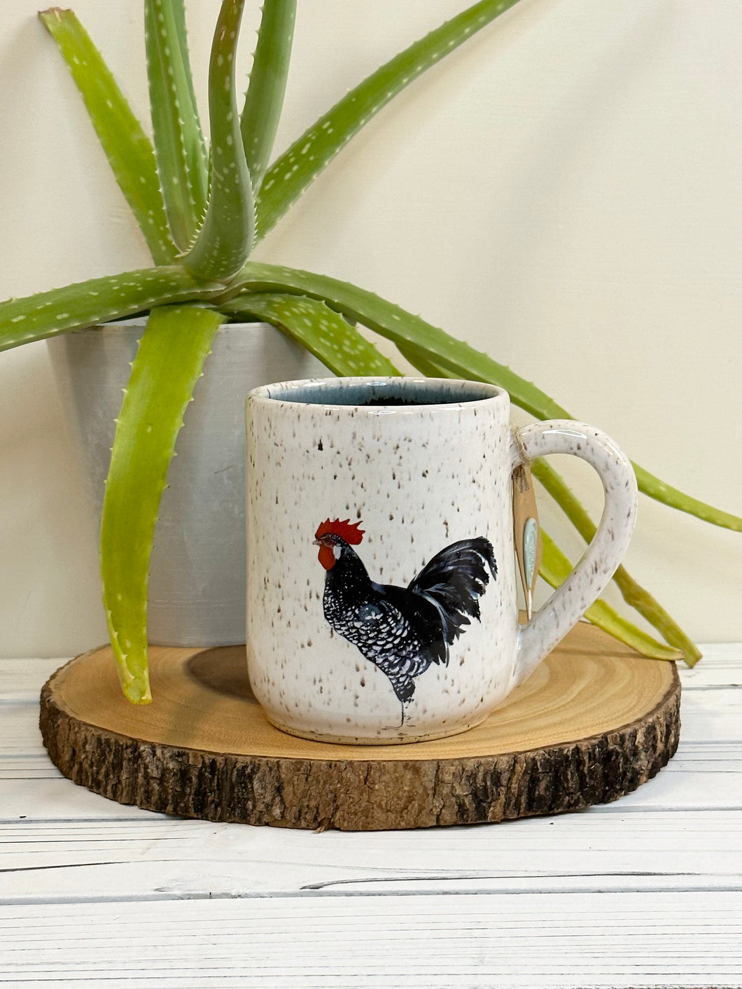 #003 - 16 oz. white speckled rooster mug with blue inside
