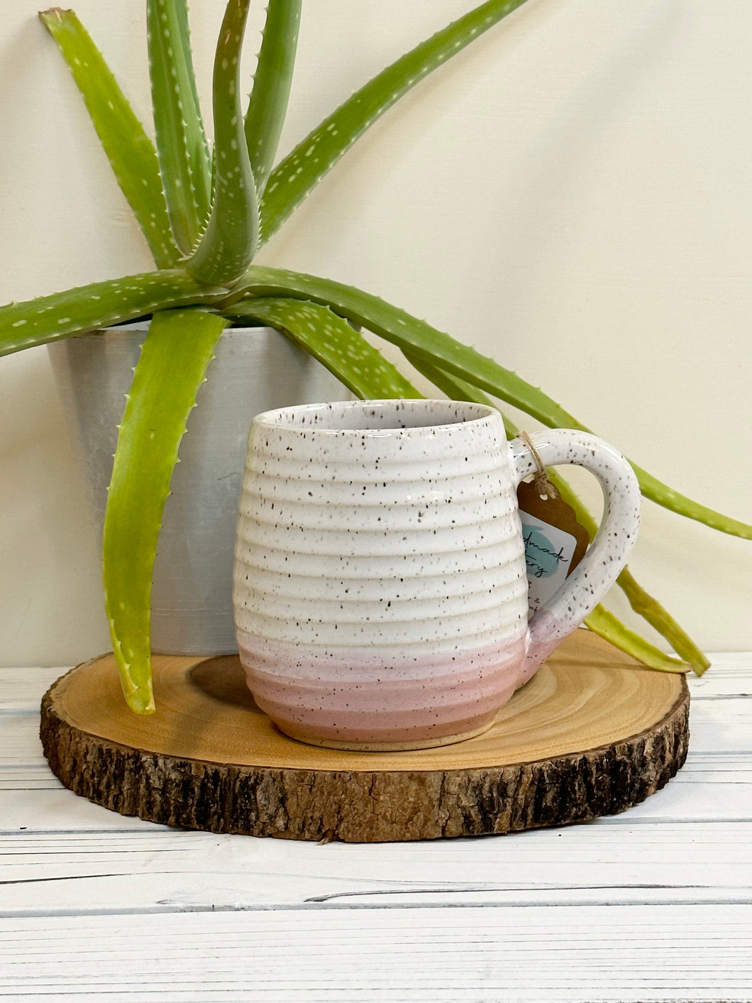 #018 - 16 oz. White and pink speckled, ridged mug