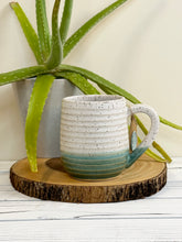 Load image into Gallery viewer, #019 - 18 oz. White and turquoise speckled, ridged mug
