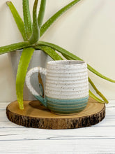 Load image into Gallery viewer, #019 - 18 oz. White and turquoise speckled, ridged mug
