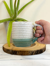 Load image into Gallery viewer, #019 - 18 oz. White and turquoise speckled, ridged mug
