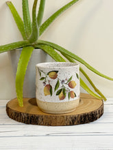 Load image into Gallery viewer, #009 - 16 oz. Lemon pattern on White speckled mug with bare clay at bottom
