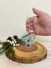 Load image into Gallery viewer, #021 - Mini pottery mug ornament with black snowflake pattern with light blue rim

