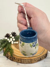Load image into Gallery viewer, #038 - Mini pottery mug ornament with blueberry pattern with blue rim *see notes
