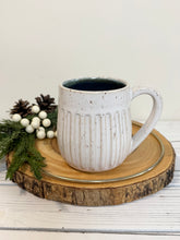 Load image into Gallery viewer, #005 - 14-16 oz. White speckled carved mug with blue inside
