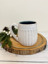 Load image into Gallery viewer, #005 - 14-16 oz. White speckled carved mug with blue inside
