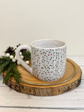 Load image into Gallery viewer, #010 - 14 oz. White speckled mug with green and red Christmas pattern
