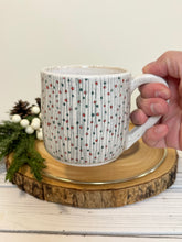 Load image into Gallery viewer, #010 - 14 oz. White speckled mug with green and red Christmas pattern
