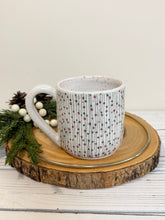 Load image into Gallery viewer, #009 - 14 oz. White speckled mug with green and red Christmas pattern
