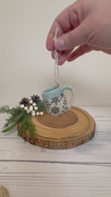 Load and play video in Gallery viewer, #021 - Mini pottery mug ornament with black snowflake pattern with light blue rim
